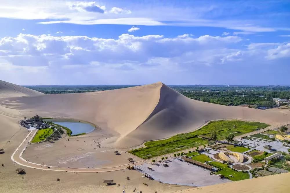 International media visits Cresent Moon Lake, Mingsha Mountain Scenic area in Dunhuang, China