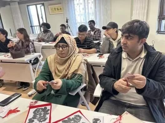 International Students Experience Chinese Culture at Spring Festival Integration Event
